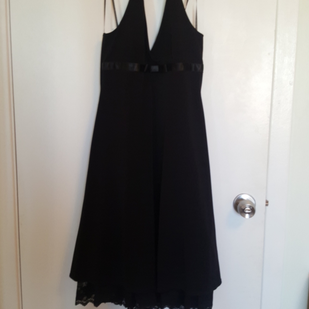 Backless black night dress with lace skirt detail